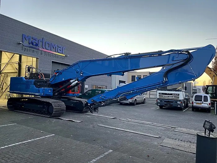 Lang-giek graafmachine na spuitwerk